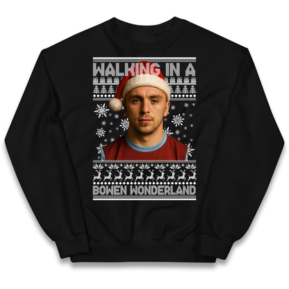 Jared Bowen walking in a Bowen Wonderland Christmas kids sweatshirt