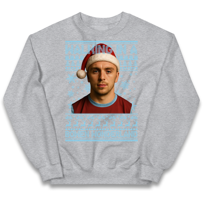 Jared Bowen walking in a Bowen Wonderland Christmas kids sweatshirt