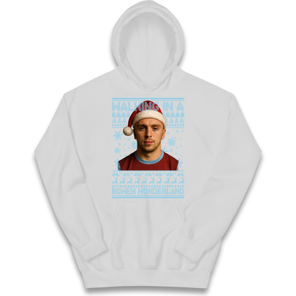 Jared Bowen walking in a Bowen Wonderland Christmas kids hoodie