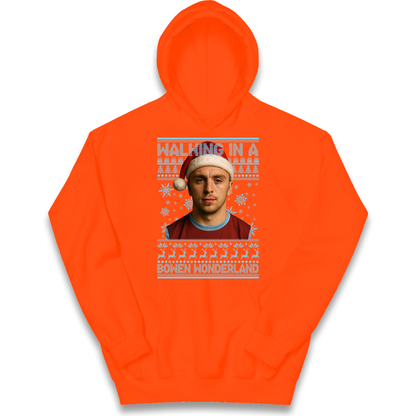 Jared Bowen walking in a Bowen Wonderland Christmas kids hoodie