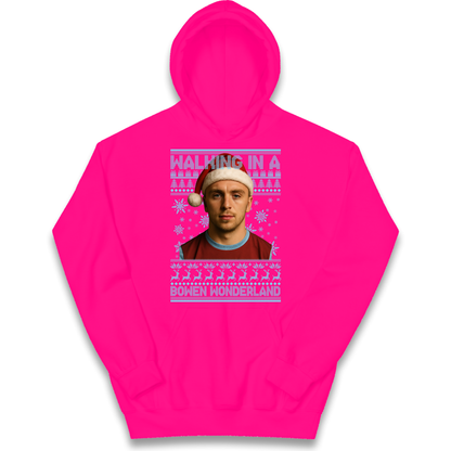 Jared Bowen walking in a Bowen Wonderland Christmas kids hoodie